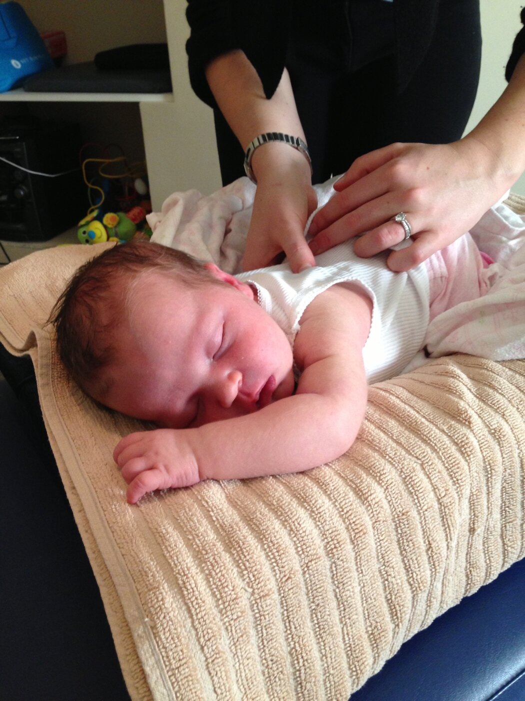 Dr Felicity Young treating a newborn